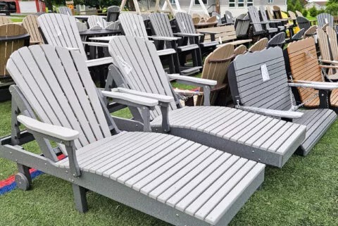 Gray and tan poly lounge chairs