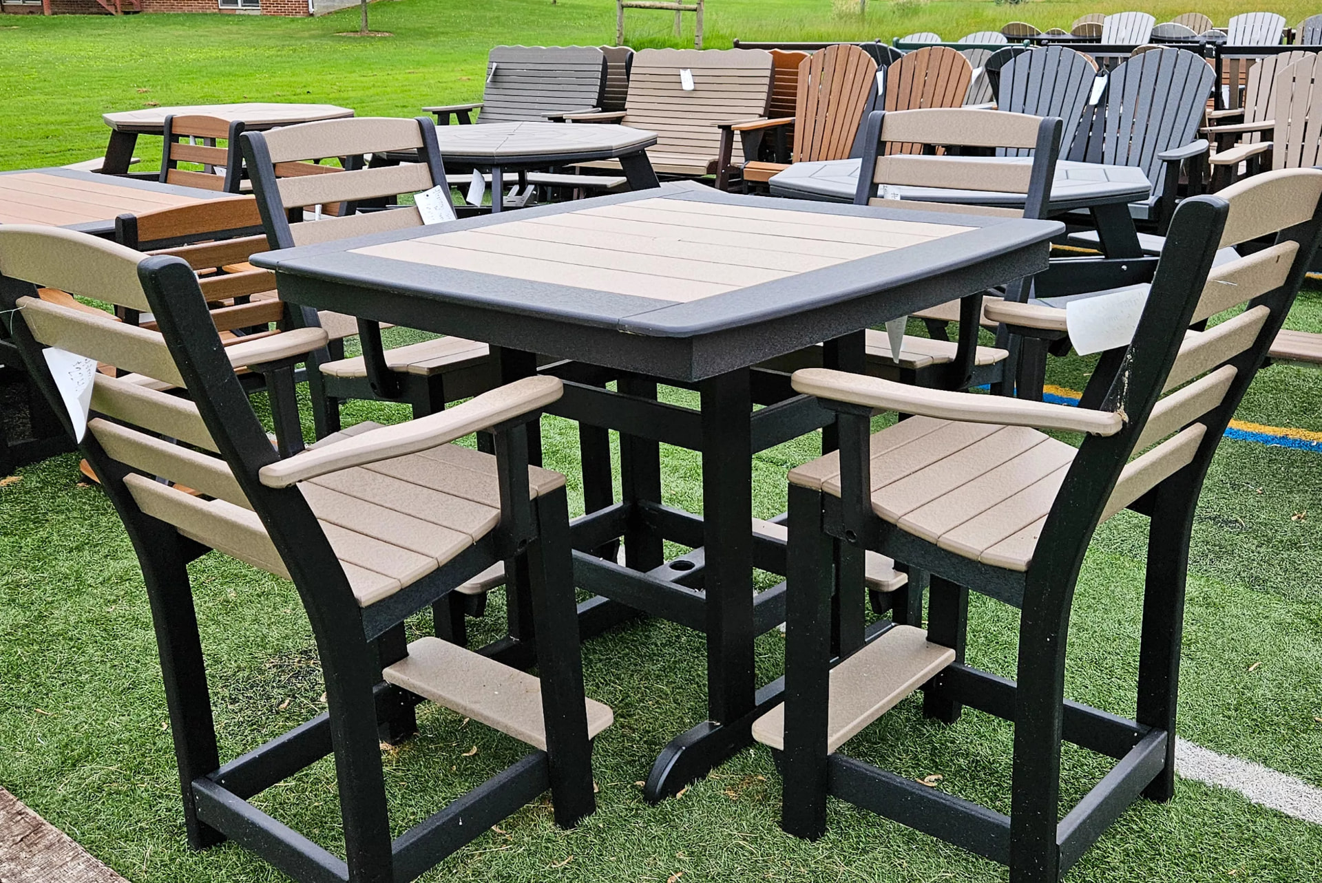Bar-height poly table with tall chairs